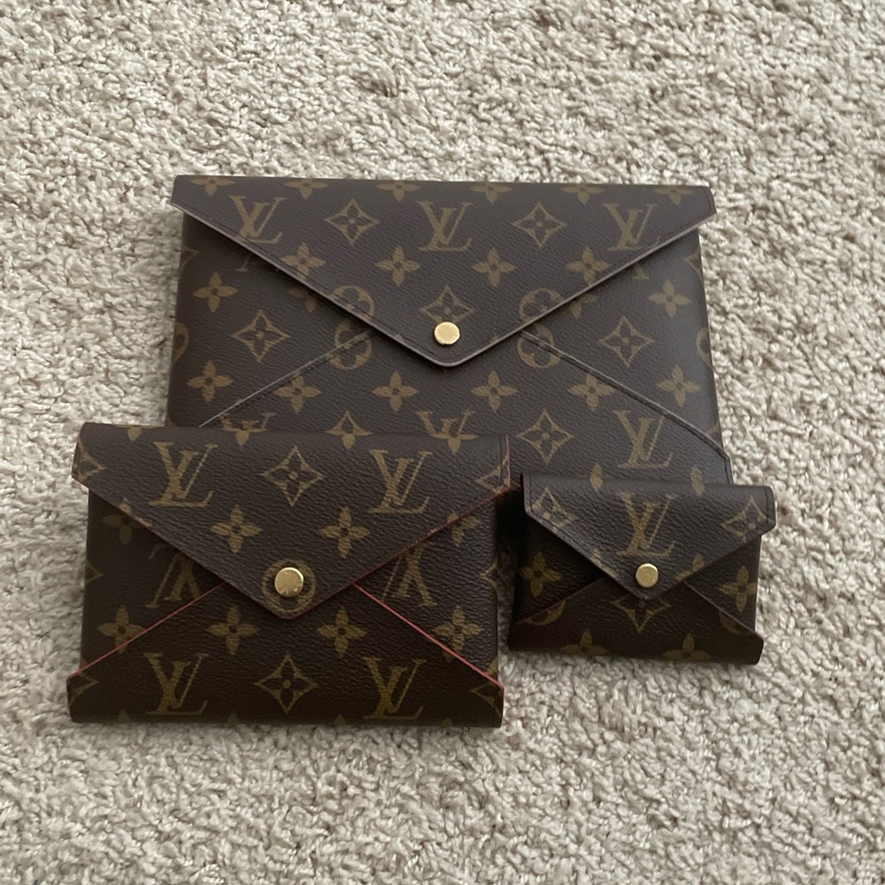 Gently used Authentic Louis Vuitton kirigami 3 piece set. With inserts and chain